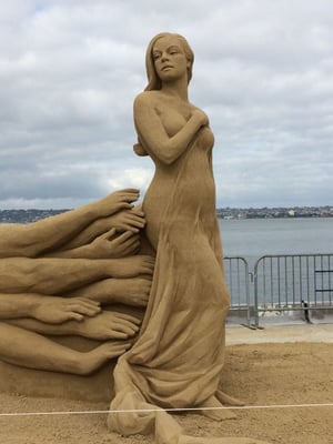 sand woman sculpture